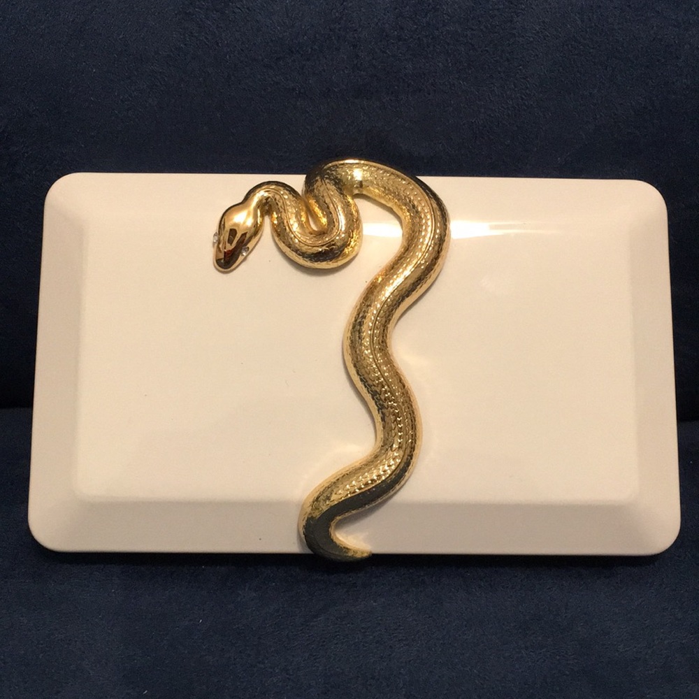 Kilian “good girl gone bad” white metal clutch